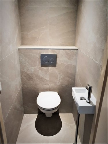 Toilet renovation by Optimum Contractors